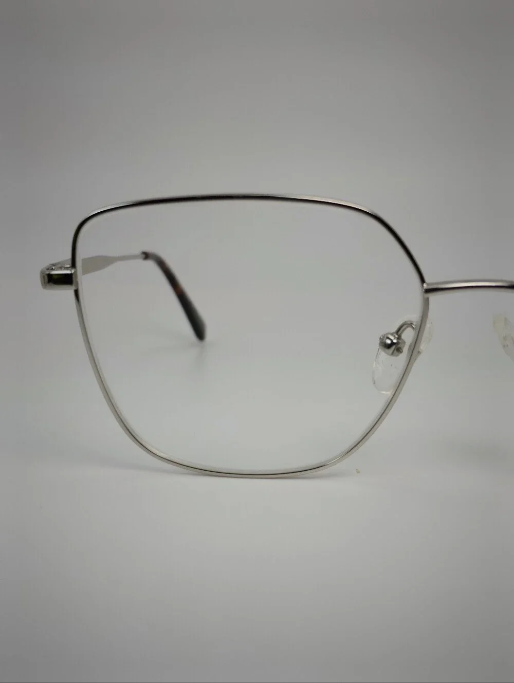 Bessie. Titiaium. Women's Oversized Square Metal Frame Glasses in Chrome.